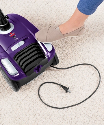 Rewinding cord back into Zing Bagged Canister Vacuum