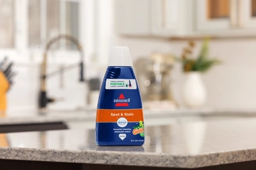 Spot & Stain with Febreze with Original Gain Scent Formula on counter. 