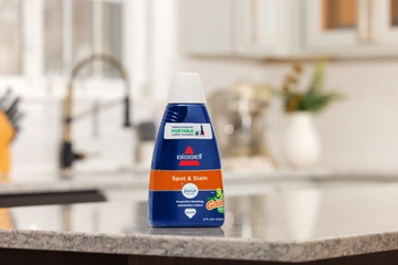 Spot & Stain with Febreze with Original Gain Scent Formula on counter.