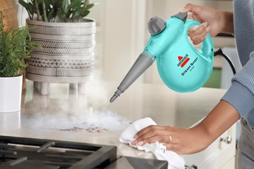 Using Steam Shot to steam kitchen counter near stove