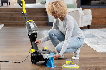Cleaning nozzle and brushes on foot of TurboClean PowerBrush Carpet Cleaner.