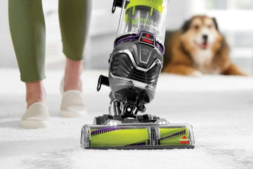 Pet Hair Eraser Turbo Plus Vacuum vacuuming pet hair from carpet.