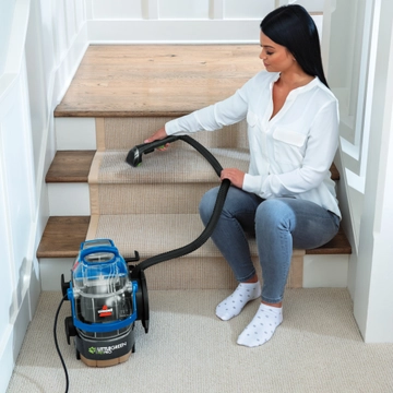 Little Green PetPro cleaning stairs.