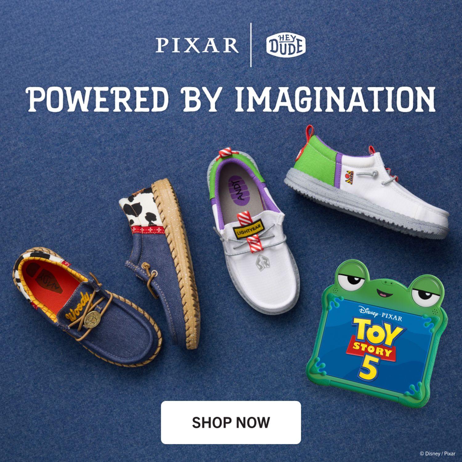 Two pairs of Pixar Toy Story themed kids' Wally Heydude slip-ons sitting on blue background with movie themed props around them
