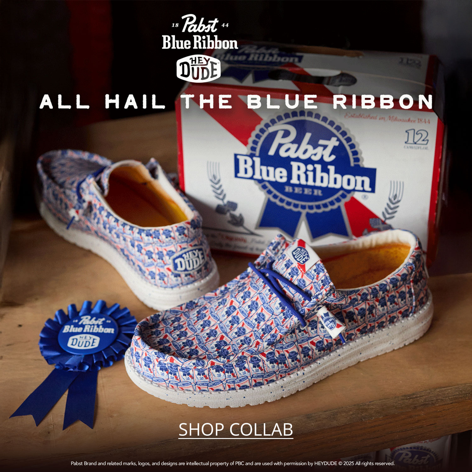 Men's Hey Dude Pabst Blue Ribbon Wall casual slipon shoe showed with a case of Pabst Blue Ribbon beer on a table