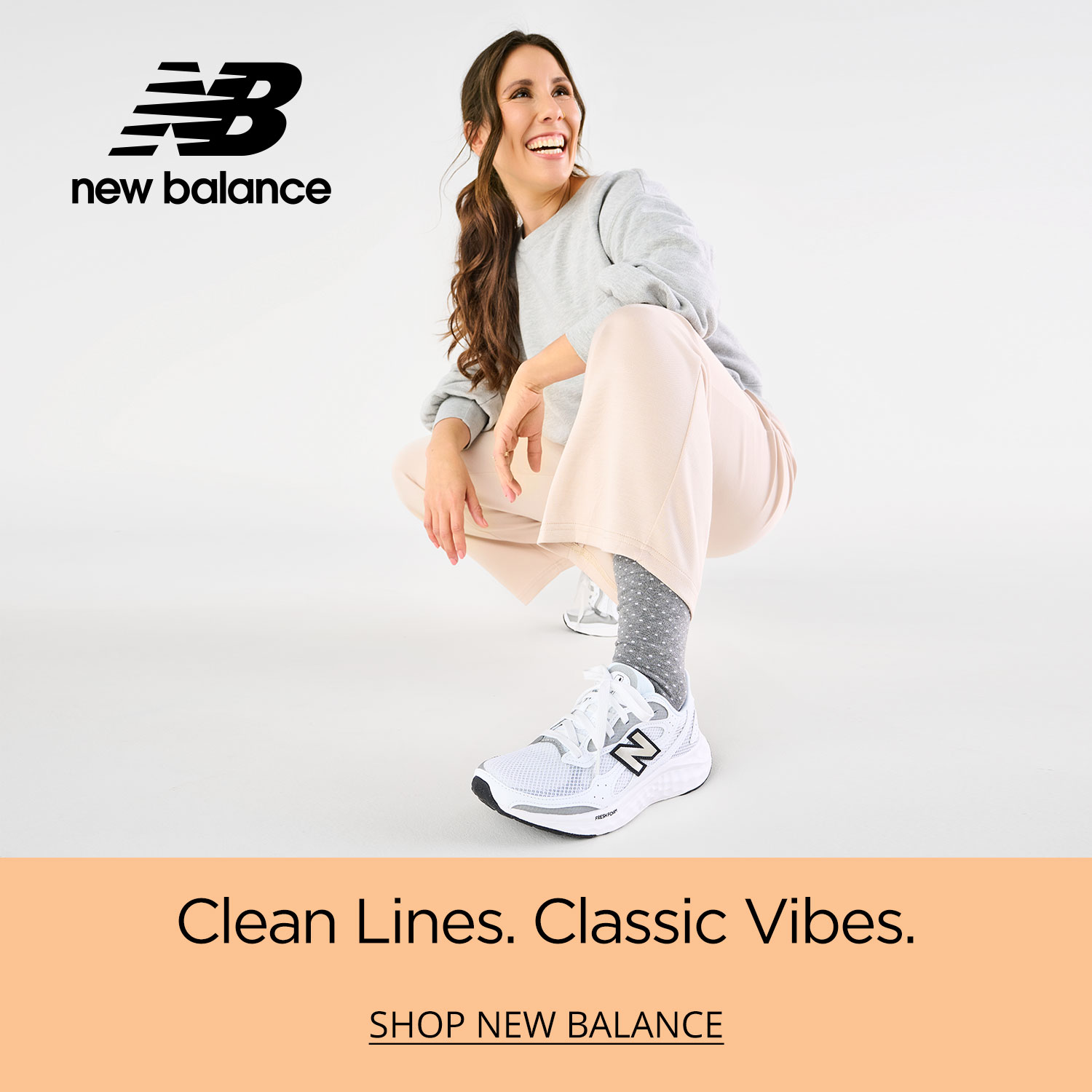 An energetic and smiling mom crouching forward with a focus on her new durable New Balance Fresh Foam Arishi Tiralux Running Shoes.