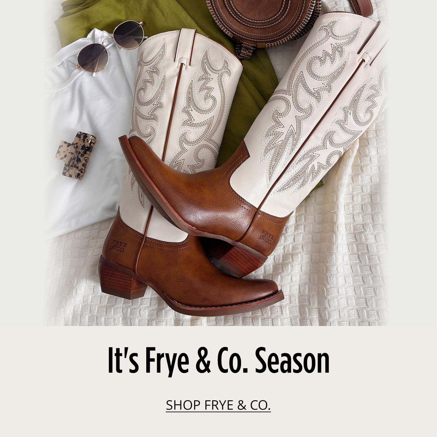 Frye and Co. boots styled with sunglasses, white tee, green pants and brown handbag on floor			