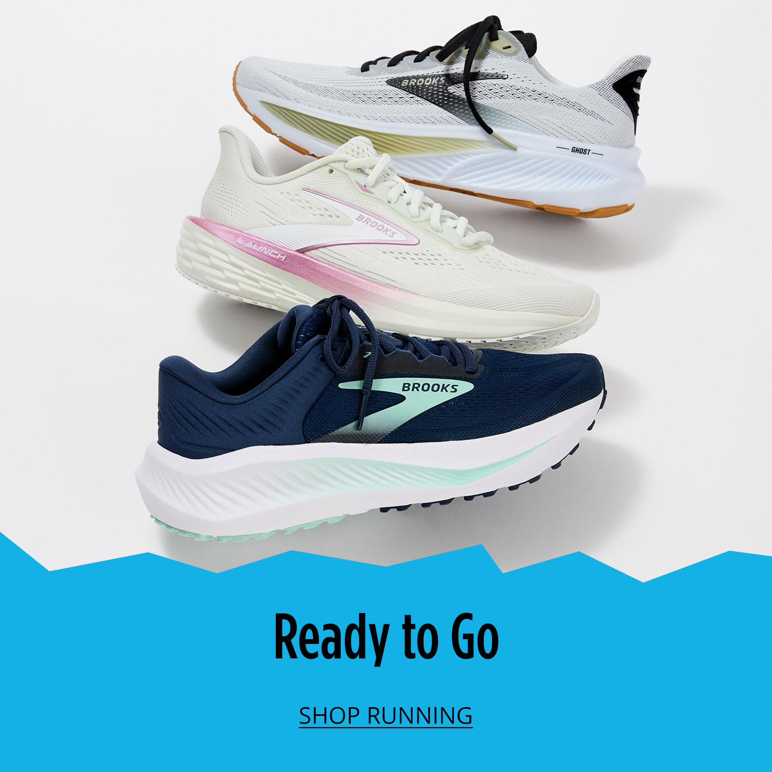 Three different Brooks athletic running shoes are vertically lined up and slightly on top of each other on white background