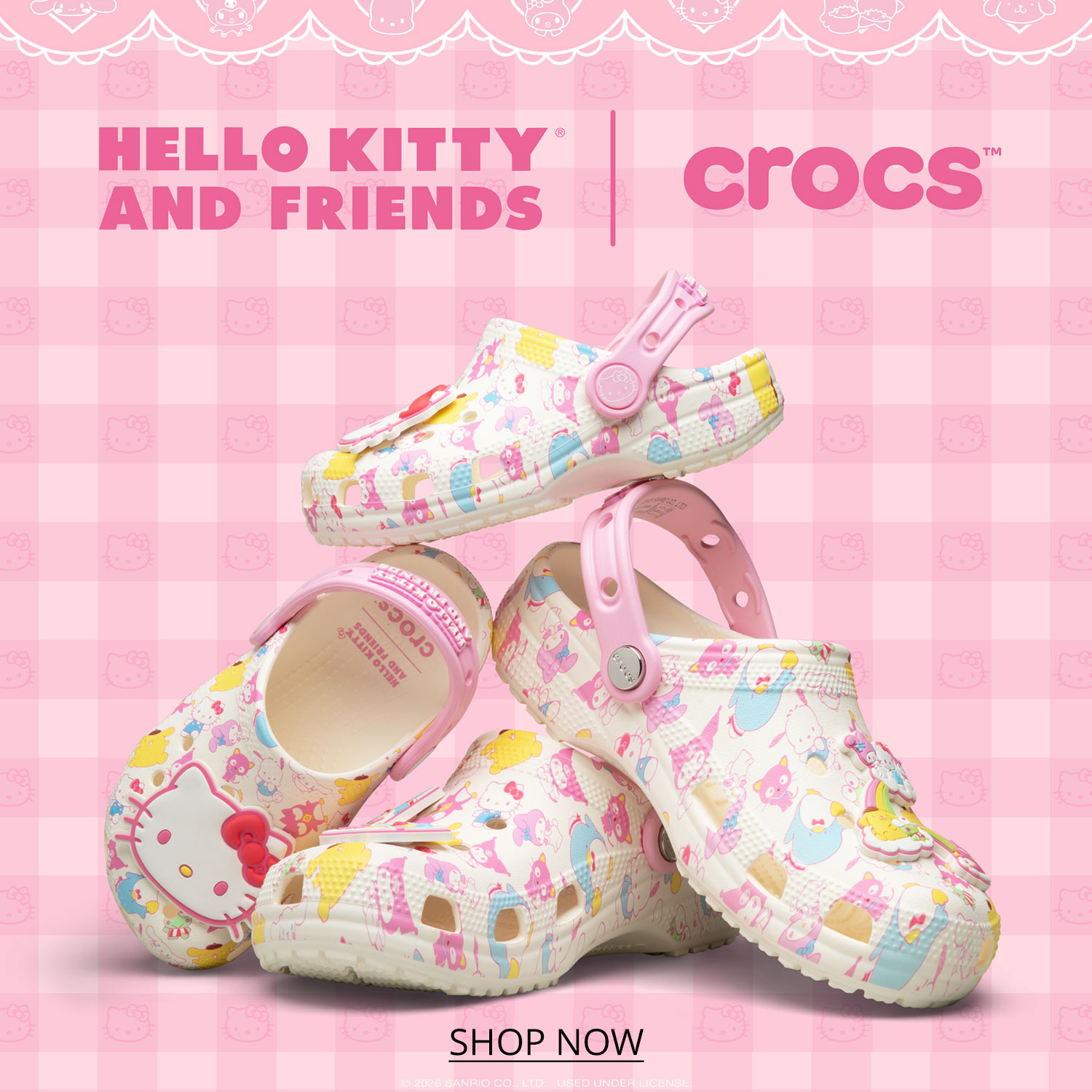 Hello Kitty and Friends women's, girl's, and toddler's Hello Kitty themed Crocs clogs stacked together against a pink gingham background.