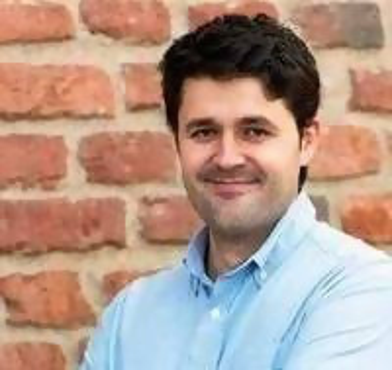 Headshot of George  Prichici