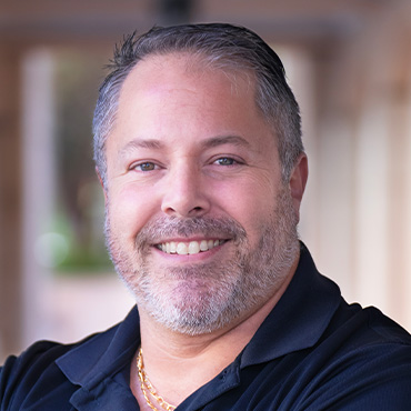 Headshot of Carlos Cajigas