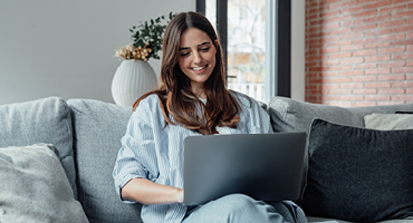 Woman typing on laptop