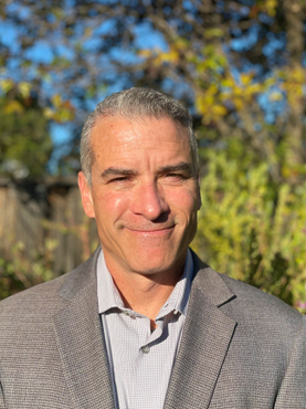 Headshot of Dan Migliore
