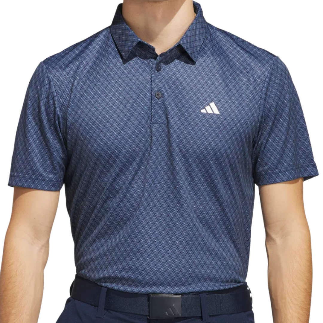 A blue, patterned short-sleeve polo shirt with a collar and buttons, featuring a logo on the chest.