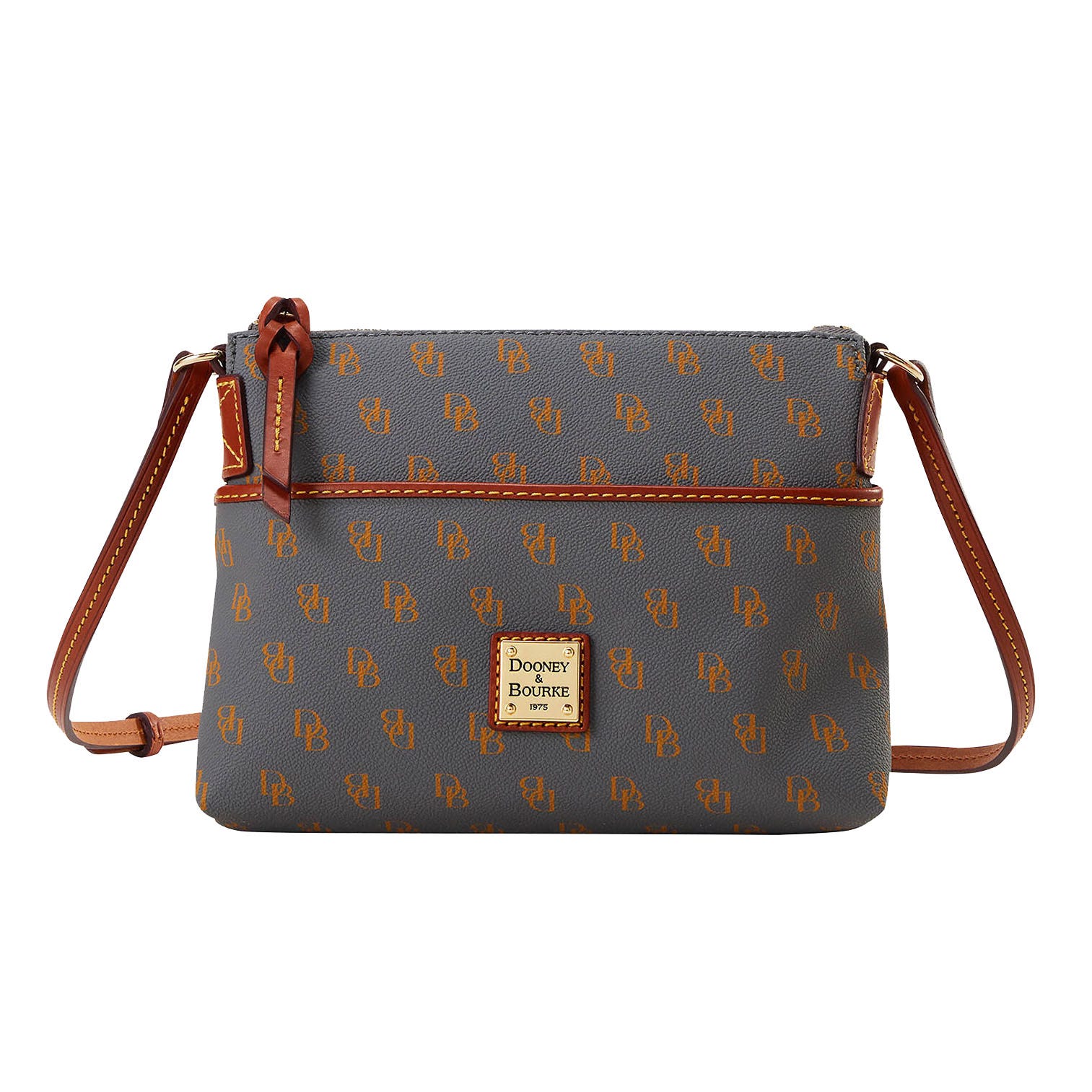 A shoulder bag with a patterned logo design and a brown leather strap.