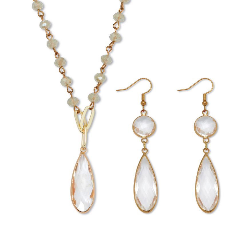 A jewelry set featuring a necklace with faceted crystal beads and a crystal teardrop pendant, paired with matching earrings that have a round and teardrop crystal drop, all set in gold-toned metal.