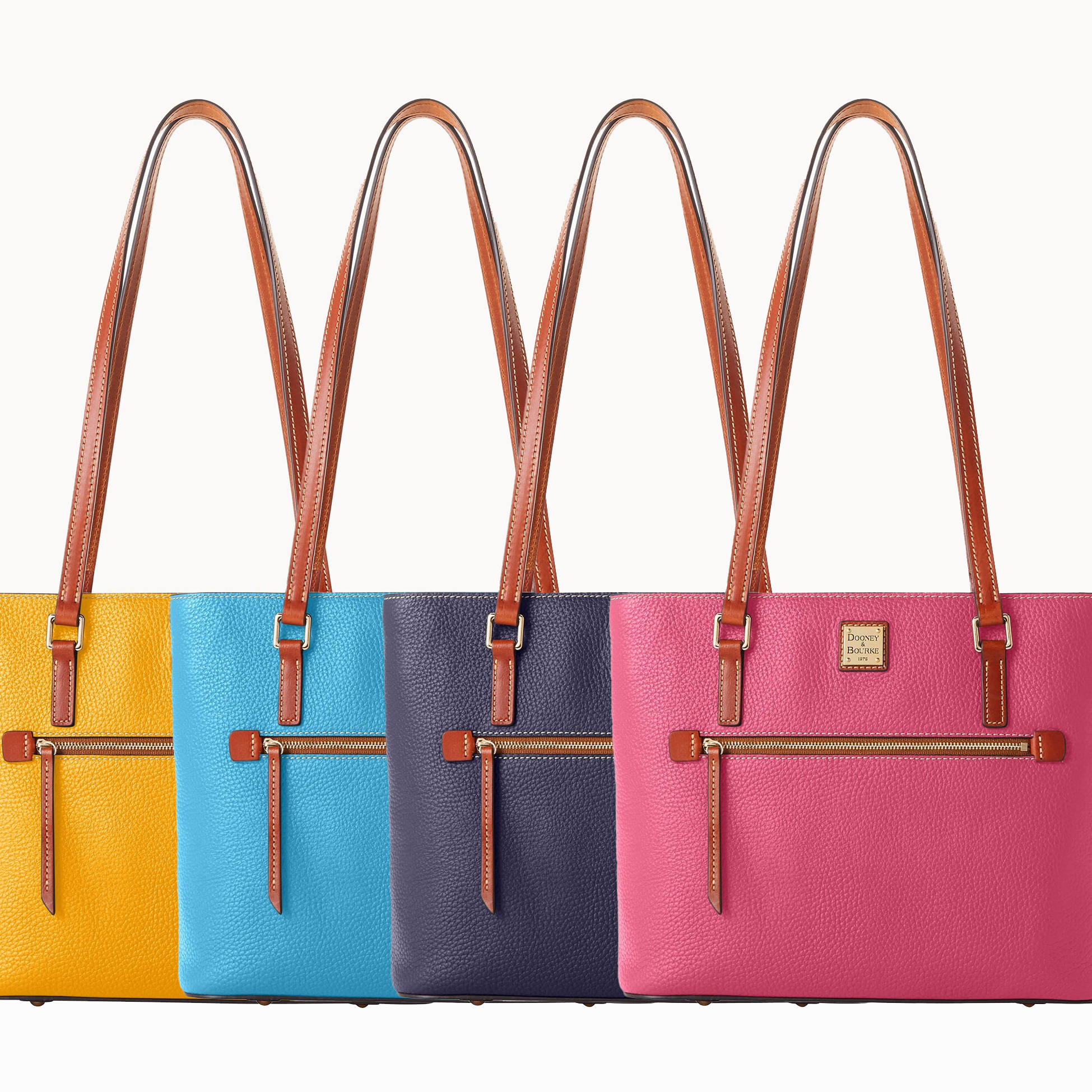 Four colorful tote bags with leather straps and front zipper details, in yellow, aqua blue, navy blue, and pink.