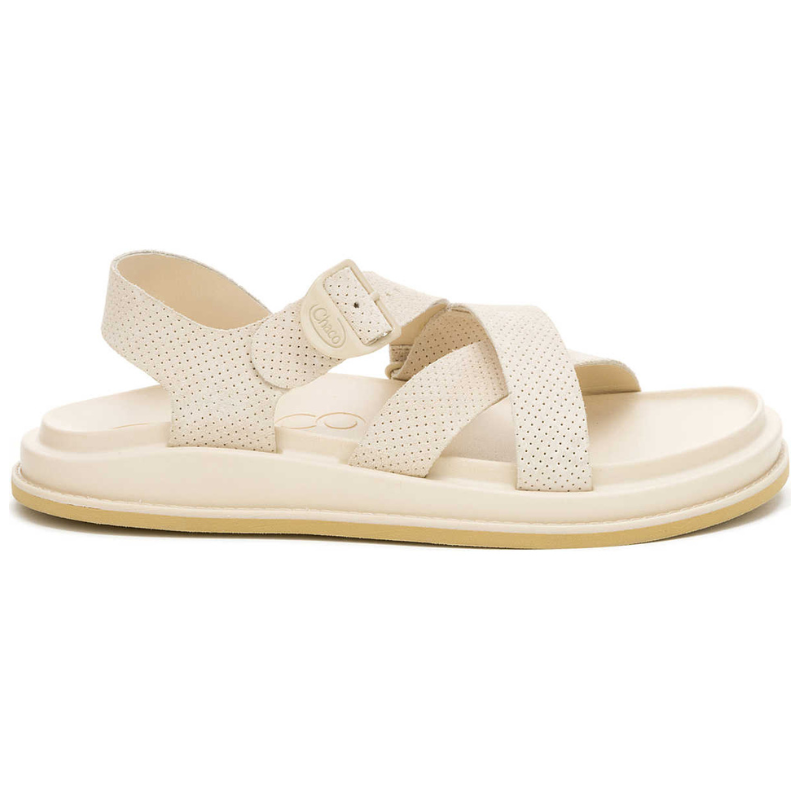 Beige sandal featuring padded soles, perforated straps, and an adjustable ankle buckle, designed for casual wear.