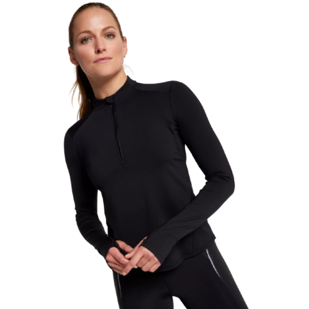A person is wearing a black, long-sleeve athletic shirt with a partial zipper and thumbholes.