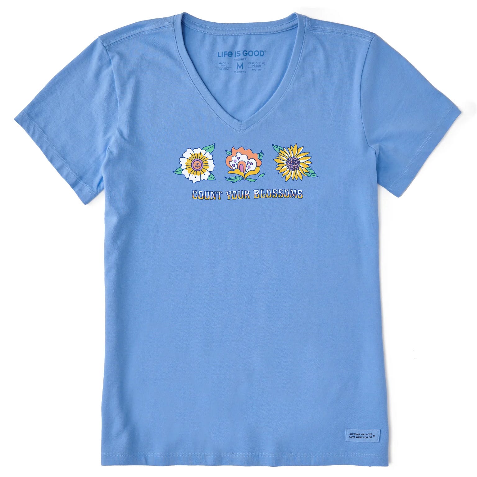 Blue V-neck T-shirt featuring three colorful flowers and the text \“Count Your Blossoms.\“