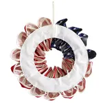 A decorative wreath featuring red, white, and blue fabric loops, designed to resemble the American flag's colors.