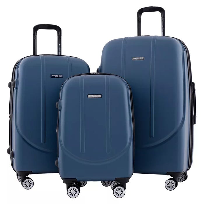A set of three blue hard shell suitcases in different sizes, each with wheels and extendable handles.