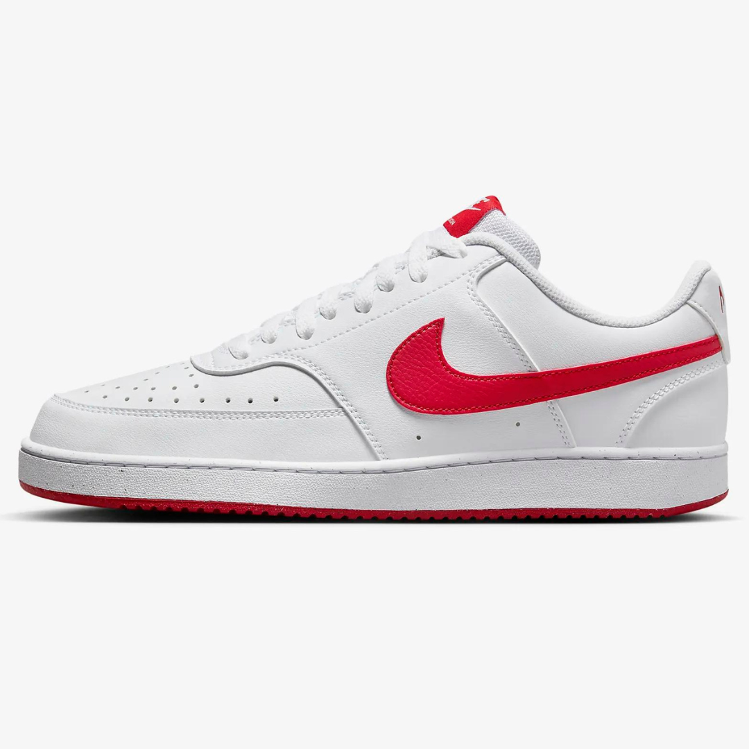 White sneaker with red swoosh logo and accents, low-top design.