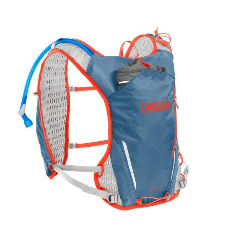 A blue and orange CamelBak hydration backpack with an integrated water tube for easy drinking.