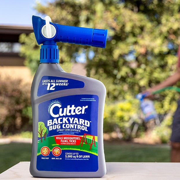 A Cutter Backyard Bug Control spray bottle designed to kill mosquitoes, fleas, and ticks and cover up to 5,000 square feet of lawn.