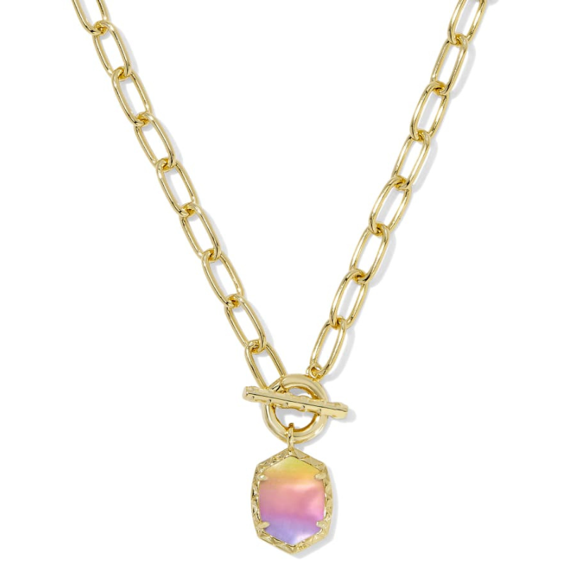 Gold chain necklace with an iridescent hexagonal pendant featuring a toggle clasp, designed by Kendra Scott.