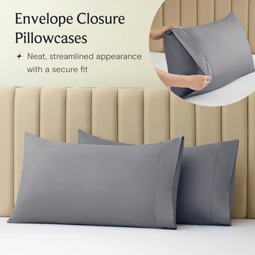 Gray pillowcases with an envelope closure design are displayed, promoting a fitted and streamlined appearance.