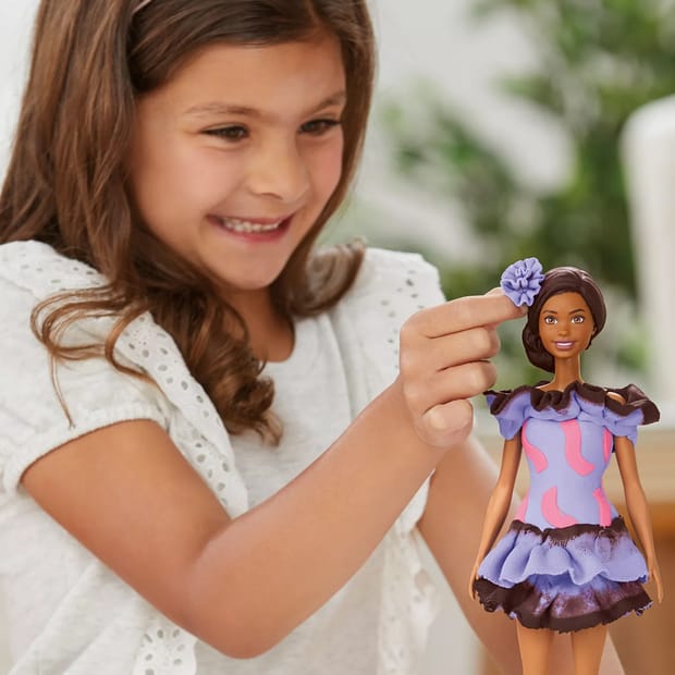 Keep the kiddos busy with up to 80% off toys, crafts, and games at Macy's. The sale includes more than 7,300 favorites. This Play-Doh Barbie Designer Fashionista Ruffles Set drops from $19.99 to $7.96. Other stores are charging $14 for the same one. Save even more on this Geoffrey's Toy Box Island Tropics Foot Spa Nail Salon Kit, which falls from $39.99 to $7.96. That's the lowest price we've seen by $10. The set includes one Inflatable foot spa, three nail polishes, one sheet of nail wraps, one sheet of nail art stickers, and much more. Shipping is free when you spend $25. Otherwise, shipping adds $10.95. Please note that some merchandise is final sale, so no returns, exchanges, or price adjustments are allowed.