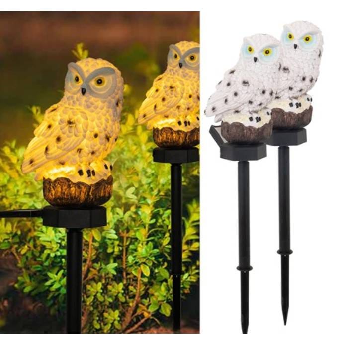 Owl-shaped garden lights mounted on stakes, presented in two different colors and illuminated.