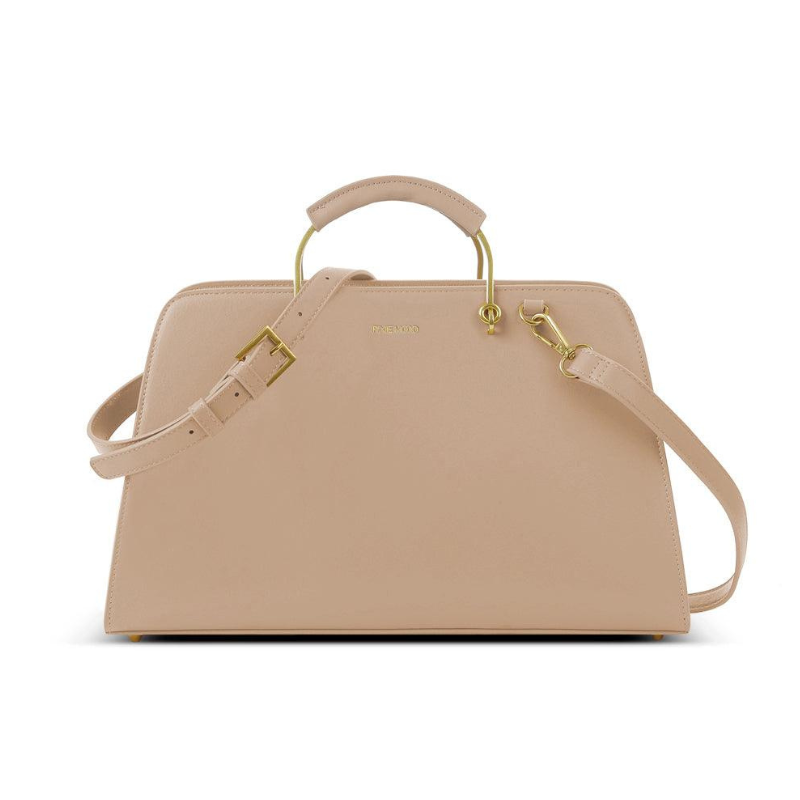 The Becca Tote Bag is a sleek, beige handbag with a structured design, featuring gold hardware, a top handle, and a detachable shoulder strap.