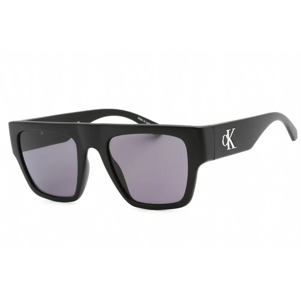 Black square-framed Calvin Klein sunglasses with dark lenses and the \“cK\“ logo on the arms.