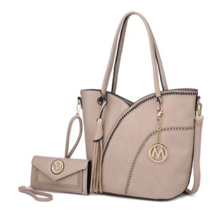 A beige handbag and matching wristlet set featuring decorative stitching, tassel accents, and gold-tone metal logos and clasps.