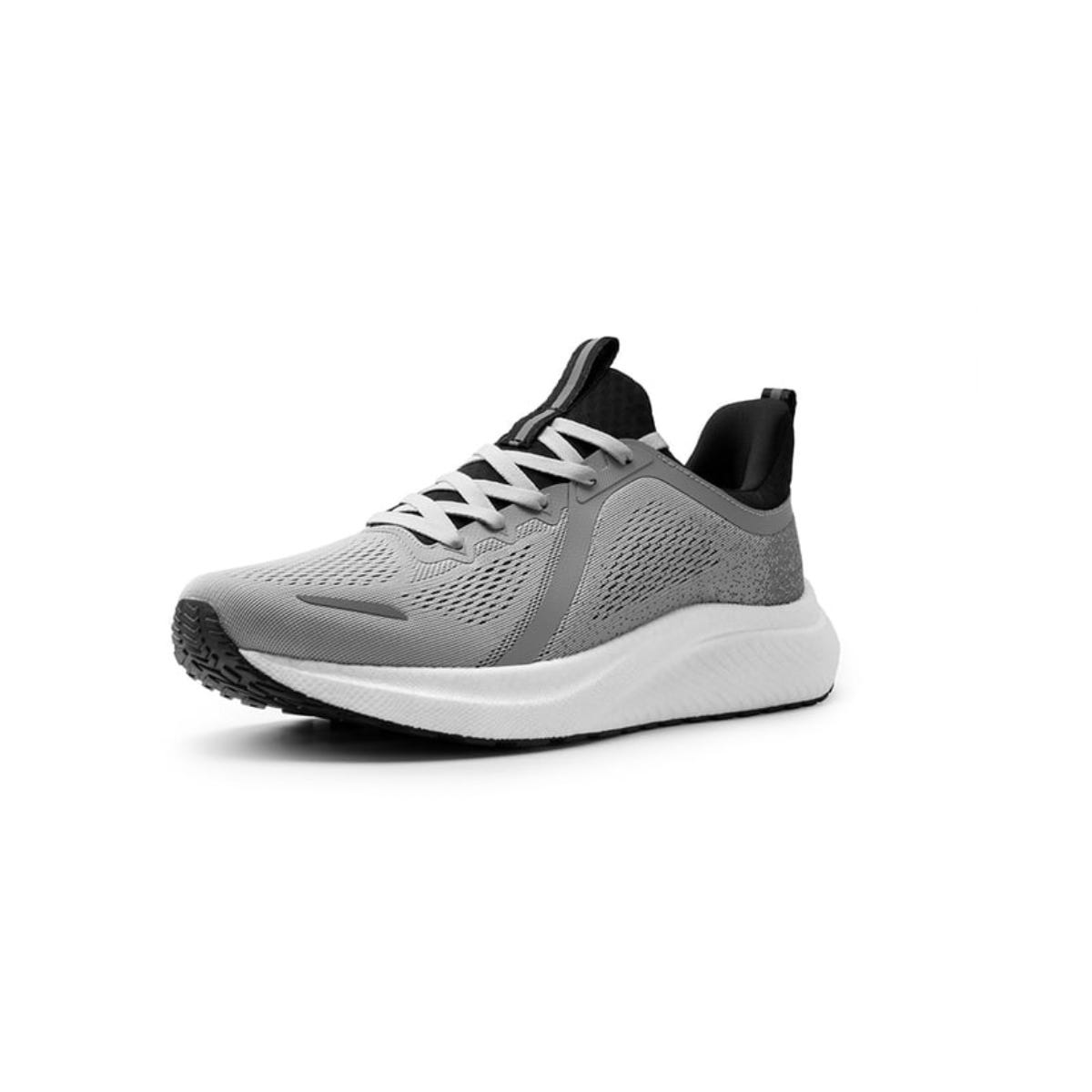 A single grey athletic sneaker with white laces and sole.