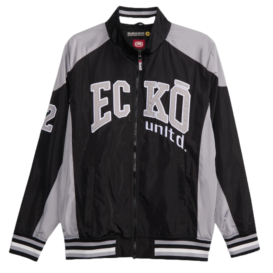 Black and gray track jacket with \“ECKO UNLTD.\“ in large white letters on the front, number \“72\“ on the left sleeve, striped cuffs, and collar.