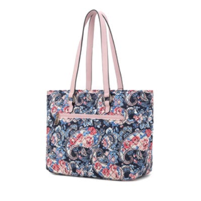 A tote bag featuring a colorful paisley and floral pattern with pink handles and a front zipper pocket.