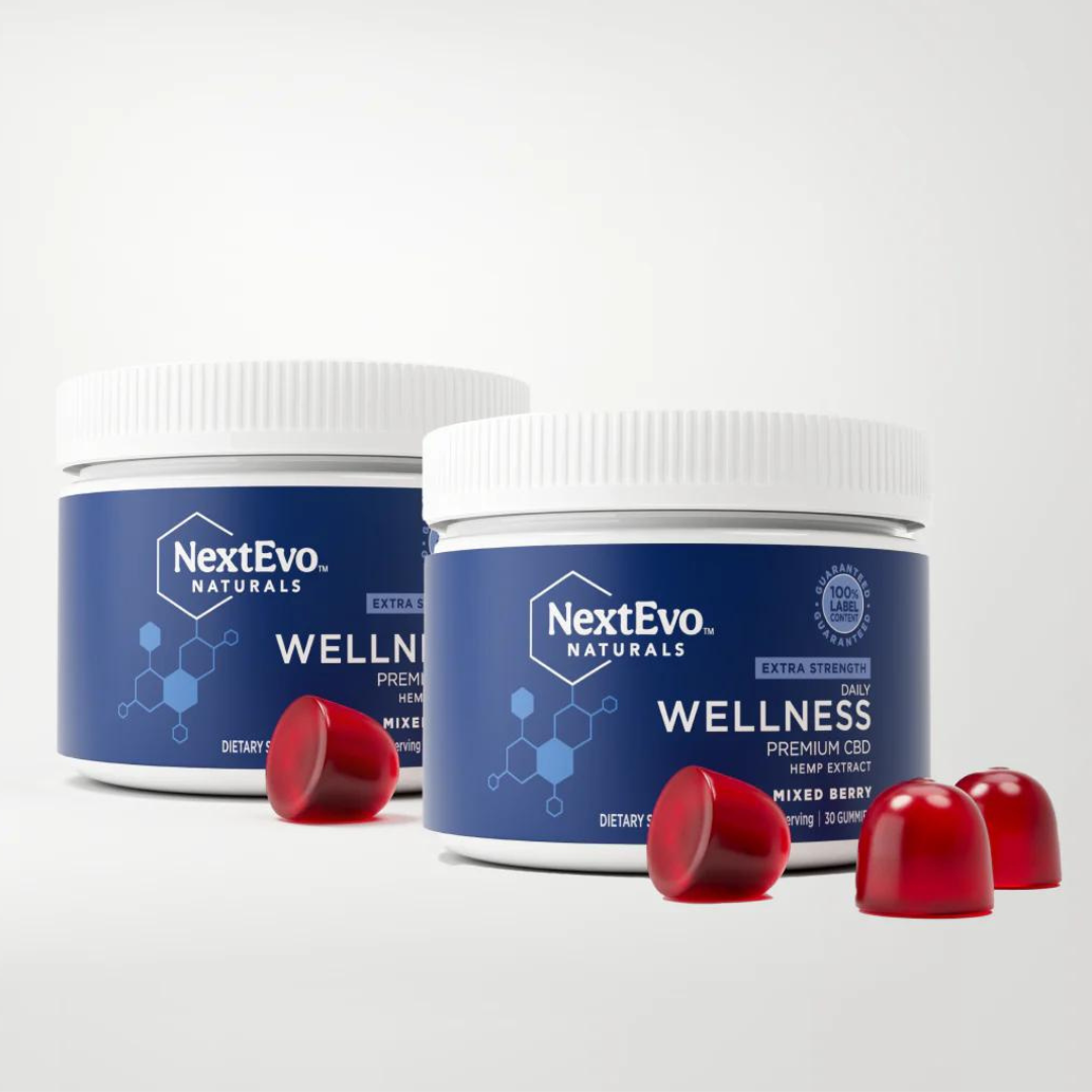 Two jars labeled NextEvo Naturals WELLNESS with red gel capsules, indicating extra strength premium CBD hemp extract.