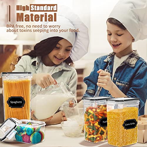 Two children wearing chef hats are using a set of transparent, BPA-free airtight food storage containers to pour and store various dry food items.