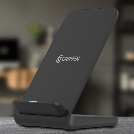 A black Griffin branded wireless charging stand with a small LED indicator light at the bottom.