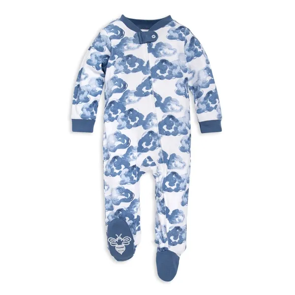 Baby pajamas featuring a blue cloud pattern on a white background, with navy cuffs and feet. It includes a zip closure and a bee design on the sole of one foot.