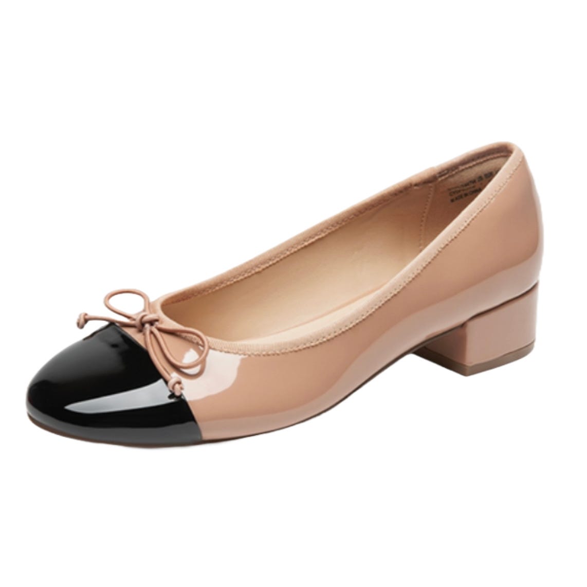 A two-tone ballet heel with a black patent toe cap and nude body, featuring a bow detail and a small block heel.
