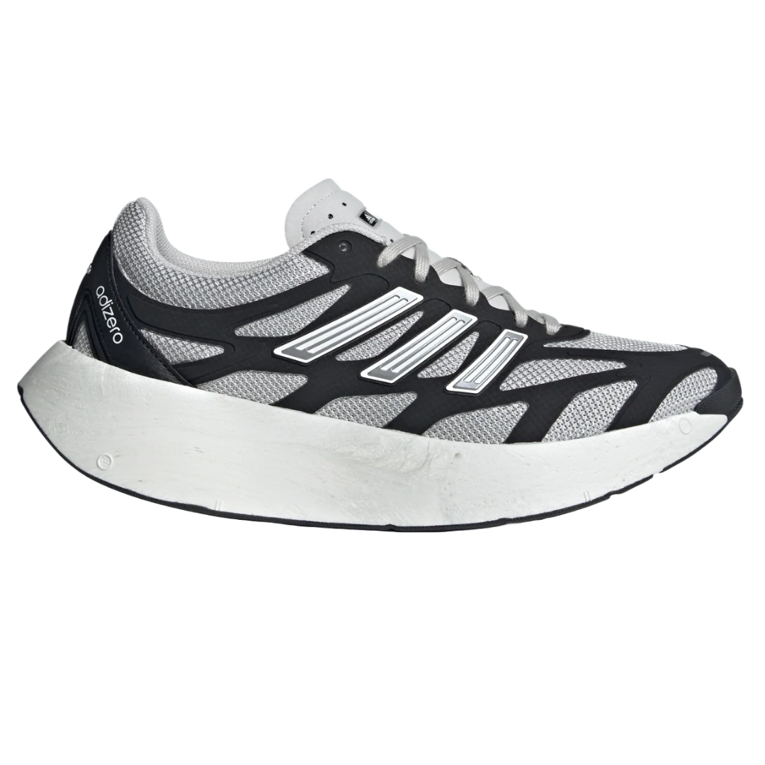A running shoe with a thick white sole and a black and gray mesh upper featuring white stripes, marked with \“adizero\“ on the heel.