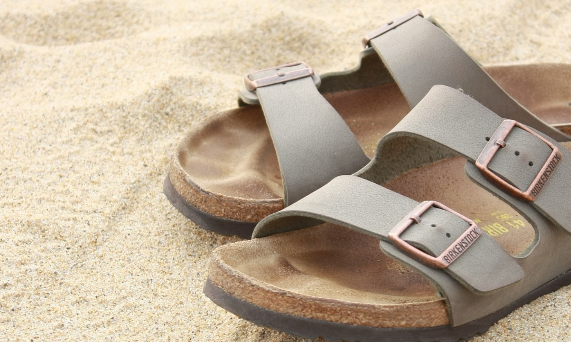 Birkenstock sandals on sand