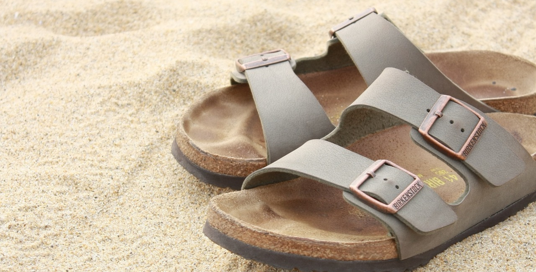 Birkenstock sandals on sand