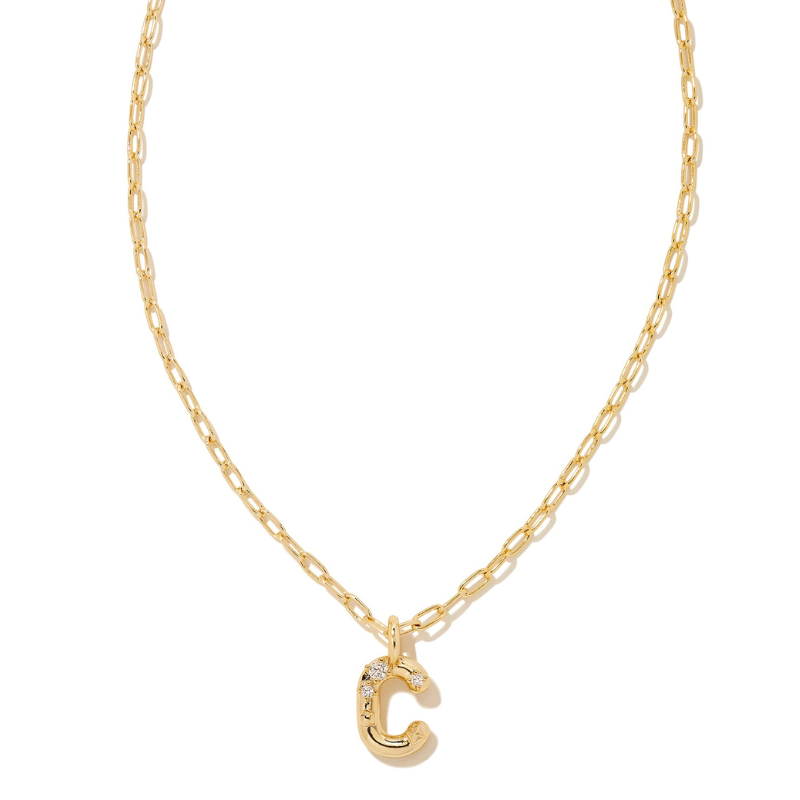 Gold chain necklace featuring a pendant shaped like the letter \“C\“ adorned with small crystals.