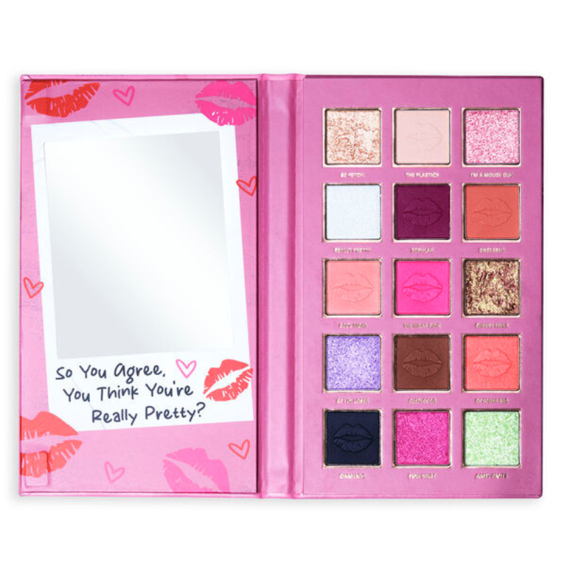 A pink eyeshadow palette with 12 shades, featuring a mix of matte, shimmer, and glitter finishes, with a mirror on the left side and a phrase printed above it.