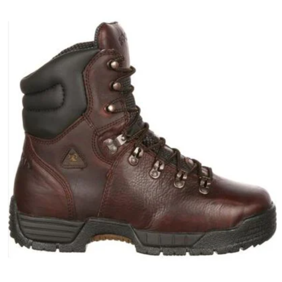 Rocky Steel Toe Work Boots feature a brown leather exterior, black padded collar, lace-up design with metal eyelets, and a durable, textured rubber sole for enhanced grip and protection.